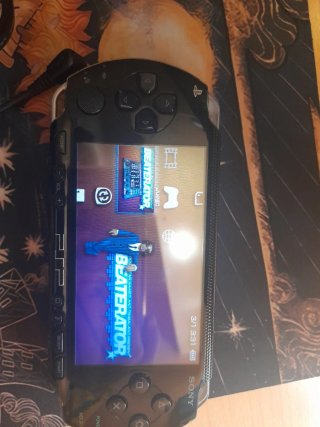 Sony PSP Nera + Memory Stick + Caricabatterie originale