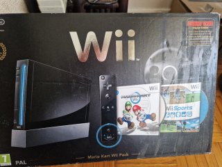 Nintendo Wii Negra Pack Mario Kart + pistola.