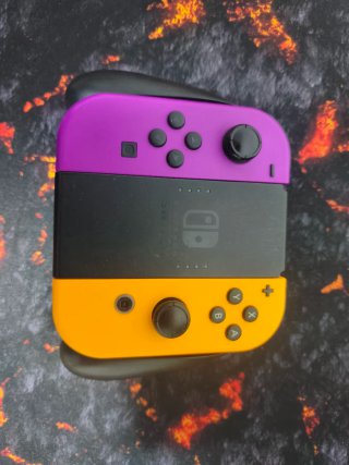 Mando Nintendo Switch Morado y Amarillo