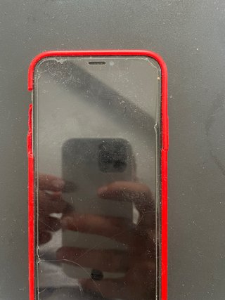 iPhone X blanco brillante con funda roja