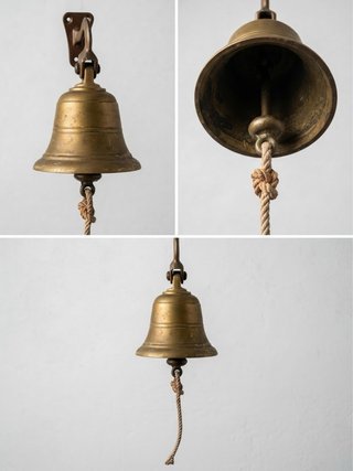 Campana de bronce antigua con cuerda