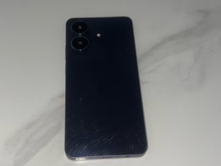 Teléfono Realme Negro Roto con Funda