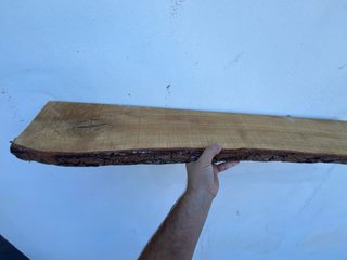Tabla de madera rústica natural
