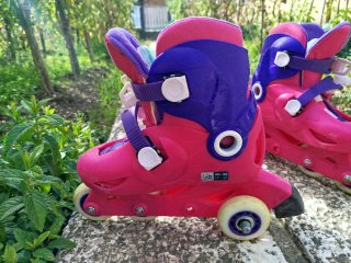Patines en línea infantiles rosas y morados