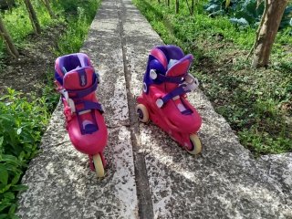 Patines en línea infantiles rosas y morados