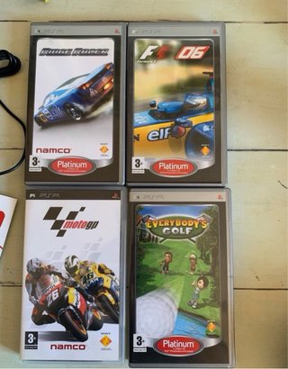 Sony PSP 1004 Nero + 4 Giochi