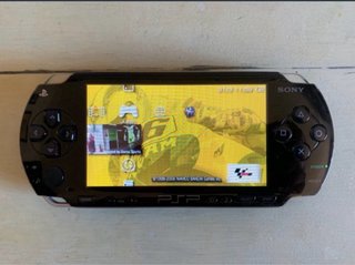 Sony PSP 1004 Nero + 4 Giochi
