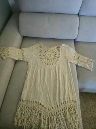 Vestido playero blanco con crochet y flecos