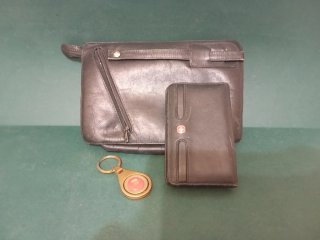 Bolso de mano y cartera de piel