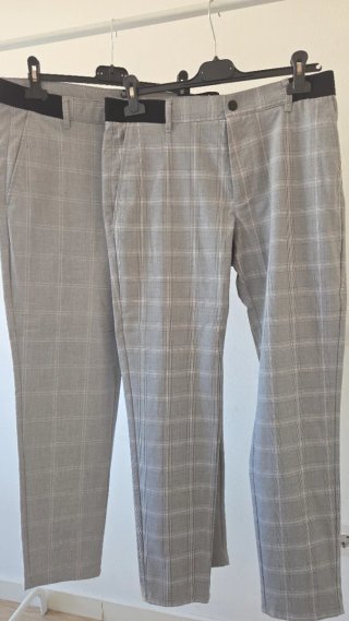 2 Pantalones de cuadros grises 12€ la unidad