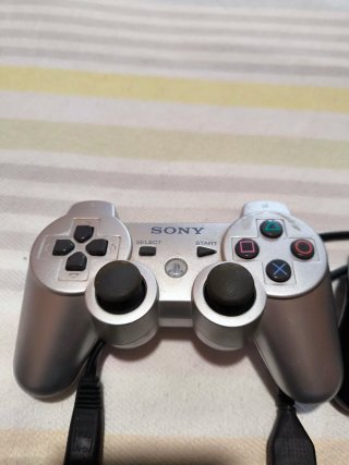 Consola PlayStation 3 con 2 mandos