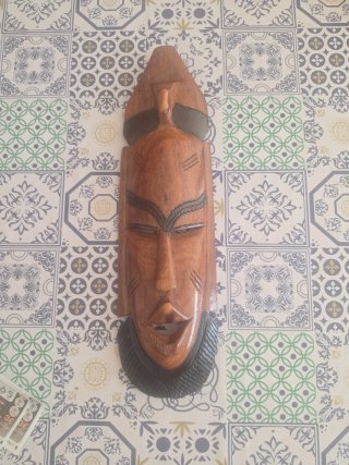 Máscara de pared de madera