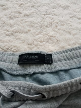 Pantalón corto gris hombre