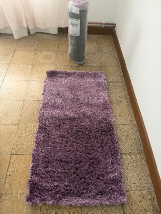 Par de alfombras de pelo largo lila