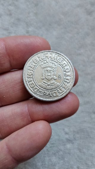 Moneda antigua con retrato