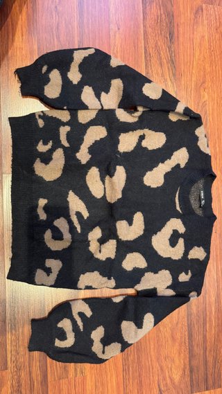 Jersey estampado leopardo negro y marrón