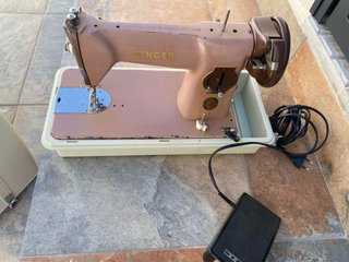 Máquina de Coser Singer Portátil rosa