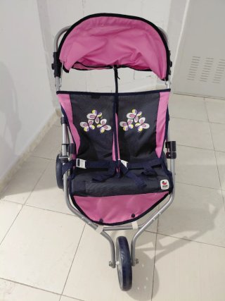 Silla de muñecas gemelar rosa