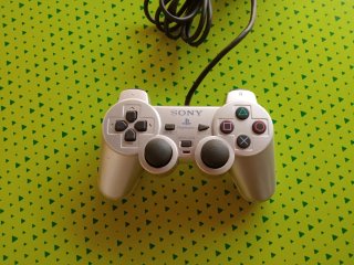 PlayStation 2 Gris/Plata Completa + Juegos Regalo