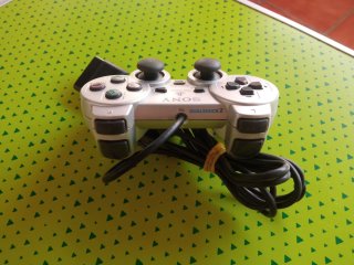 PlayStation 2 Gris/Plata Completa + Juegos Regalo