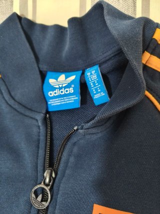 Sudadera Adidas azul y naranja