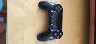 PS4 (PlayStation 4) con mando y juegos
