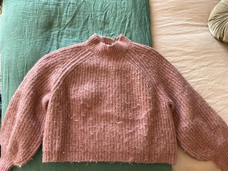 Jersey rosa de lana con cuello alto