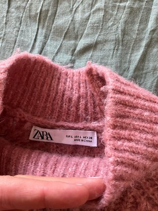 Jersey rosa de lana con cuello alto