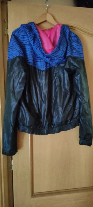Chaqueta deportiva mujer azul y negra