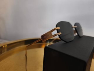 Gafas de sol Versace negras y doradas
