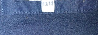 Chaqueta sin mangas azul con ribetes