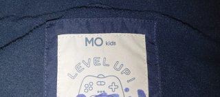 Chaqueta sin mangas azul con ribetes