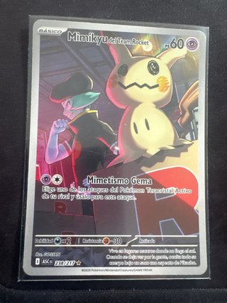 Carta Pokémon Mimikyu del Team Rocket