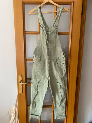 Peto vaquero verde desgastado