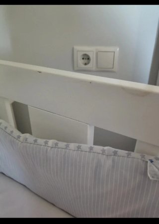 Minicuna blanca con ruedas