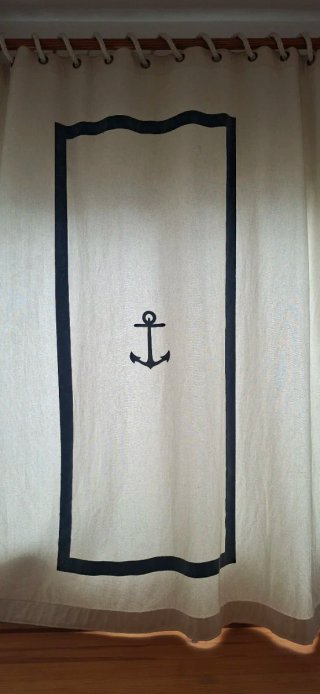 Cortina marinera que sirvió de colcha de un barco