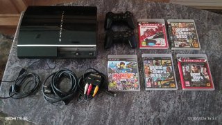 Consola PS3 (PlayStation 3) con juegos y mandos