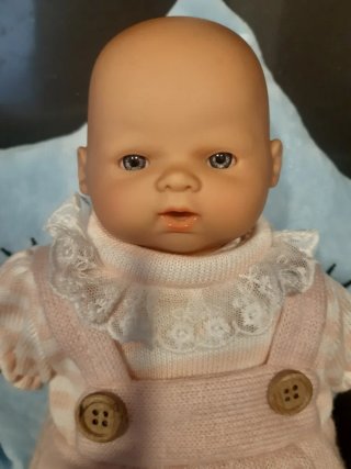 Muñeca con Cojín de Estrella.