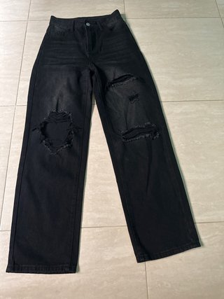 Pantalones anchos negros con cortes