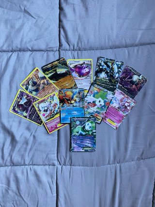 Lote de 11 Cartas Pokémon EX variadas.