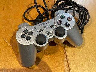 Mando Original PS2 DualShock 2 Plata
