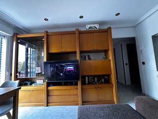 Mueble de salón madera y cristal