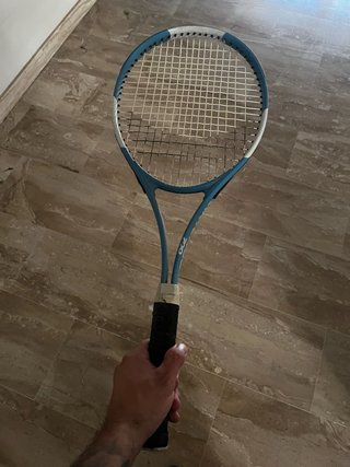 Raqueta de tenis azul