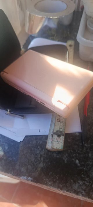 Nintendo DS Lite Rosa con caricatore e pennino, 7 giochi inclusi
