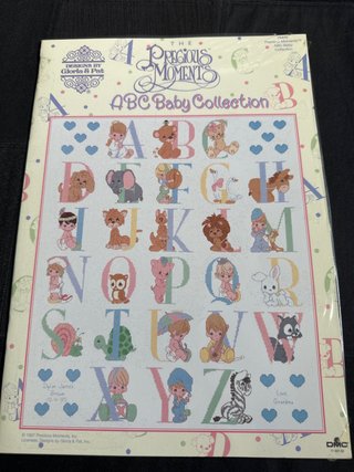 Libro punto de cruz ABC Baby collection