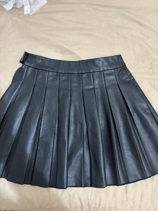 Falda plisada negra