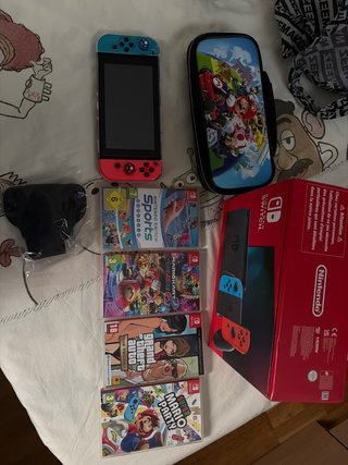 Nintendo Switch + Juegos y Accesorios