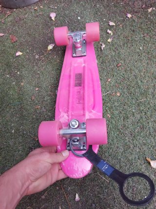 Monopatín rosa