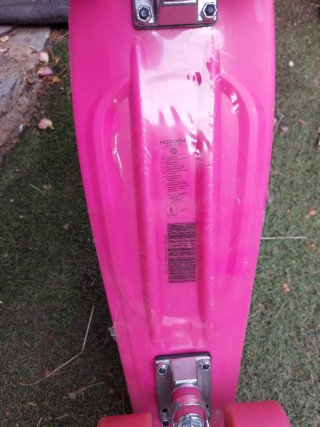 Monopatín rosa