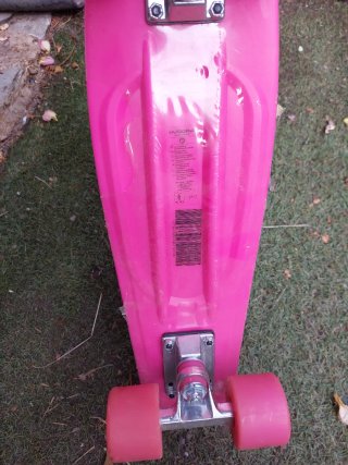 Monopatín rosa